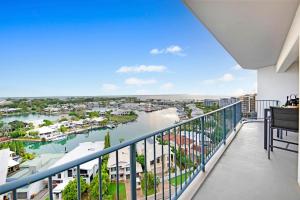 a balcony with a view of a harbor at Sunset Penthouse - Unique Panoramic Rooftop Retreat in Larrakeyah