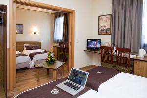 TV a/nebo společenská místnost v ubytování Tulip Inn Padova