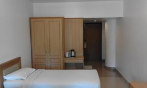 Malabar Residency客房内的一张或多张床位