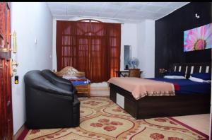 Postel nebo postele na pokoji v ubytování The bawa guest Inn