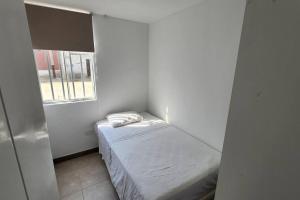 Ένα ή περισσότερα κρεβάτια σε δωμάτιο στο Todo un Departamento entero Para ti +3 φωτογραφίες