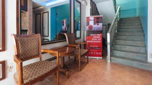 Area soggiorno di RedDoorz at Isabelita Hotel Tuguegarao City