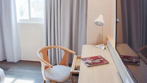 Postel nebo postele na pokoji v ubytování Hu House