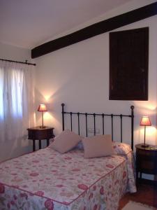 Postel nebo postele na pokoji v ubytování Hotel Posada Molino del Cubo