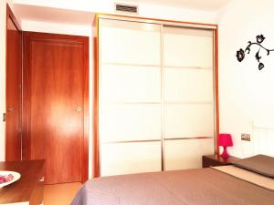 Postel nebo postele na pokoji v ubytování Lloret Beach Apartments