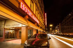 a car parked in front of a hotel national shopping centre at Centro Hotel National Frankfurt City in Frankfurt/Main