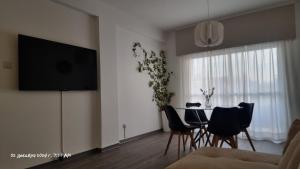 TV a/nebo společenská místnost v ubytování Beach apartment's