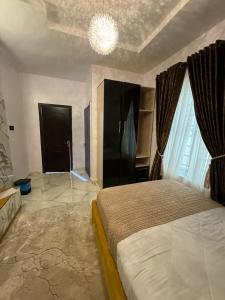 Postel nebo postele na pokoji v ubytování Jibams Apartment Two