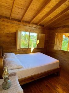 Postel nebo postele na pokoji v ubytování La Cabaña de Blue