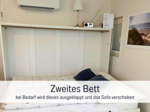 Hausboot Claudia Maasbommel客房内的一张或多张床位