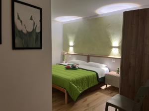 Rúm í herbergi á B&b Niu Susu