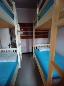 Postel nebo postele na pokoji v ubytování gigafa homestay