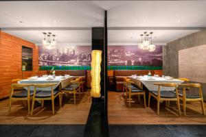 Restaurace v ubytování 重庆时代同辉酒店 龙湖时代天街重医附一院店