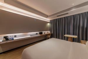 Photo de la galerie de l'établissement Luyue Hotel Movie Hotel Huaqiangbei Convention and Exhibition Center Branch, à Shenzhen