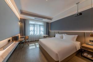 Photo de la galerie de l'établissement Luyue Hotel Movie Hotel Huaqiangbei Convention and Exhibition Center Branch, à Shenzhen