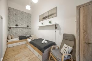 Posedenie v ubytovaní Deluxe n' Cozy City Center 2BEDRM Suite