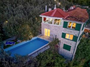 an overhead view of a house with a swimming pool at Villa Sanja - Makarska Exklusiv in Makarska