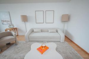 Posedenie v ubytovaní Designer-Apartment zum Wohlfühlen