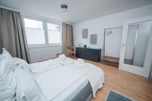 Posteľ alebo postele v izbe v ubytovaní Designer-Apartment zum Wohlfühlen