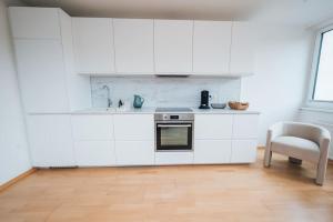 Kuchyňa alebo kuchynka v ubytovaní Designer-Apartment zum Wohlfühlen