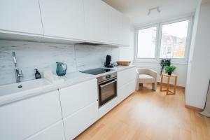 Kuchyňa alebo kuchynka v ubytovaní Designer-Apartment zum Wohlfühlen + 31 fotografií