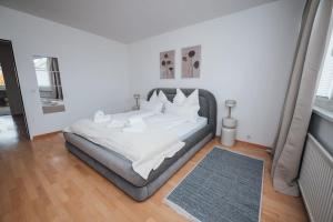 Posteľ alebo postele v izbe v ubytovaní Designer-Apartment zum Wohlfühlen
