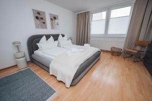 Posteľ alebo postele v izbe v ubytovaní Designer-Apartment zum Wohlfühlen