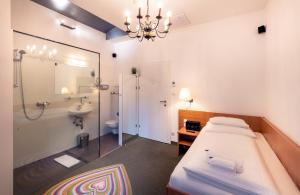 Kúpeľňa v ubytovaní BoutiqueHOTEL Donauwalzer