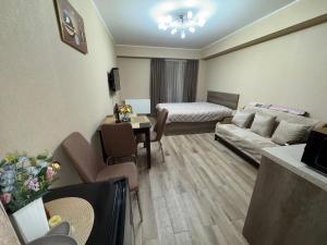 Postelja oz. postelje v sobi nastanitve Giorgi Apartment In New Gudauri - Block 3 - N315