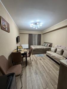 Predel za sedenje v nastanitvi Giorgi Apartment In New Gudauri - Block 3 - N315