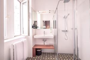 Kúpeľňa v ubytovaní BoutiqueHOTEL Donauwalzer