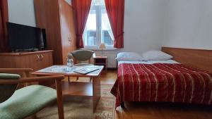 Posteľ alebo postele v izbe v ubytovaní Pensjonat Witoldówka