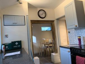Kuchyň nebo kuchyňský kout v ubytování Myrtle cottage