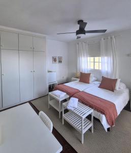 Ένα ή περισσότερα κρεβάτια σε δωμάτιο στο Los Campitos ROOMS