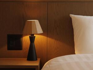 Postel nebo postele na pokoji v ubytování Smart Place Inn Kyoto Nijojo-mae Station