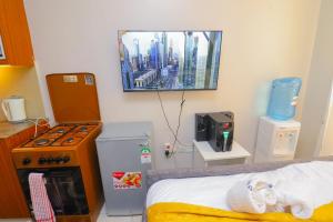 TV a/nebo společenská místnost v ubytování Kimsy Signature Homes