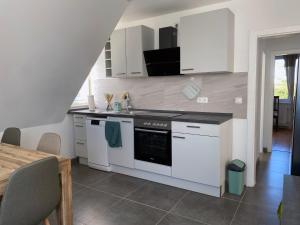 Kuchyň nebo kuchyňský kout v ubytování Apartment Zausel