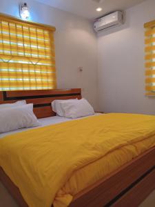 Postel nebo postele na pokoji v ubytování 501 Aparthotel