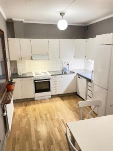 Kuchyň nebo kuchyňský kout v ubytování Park Hotell
