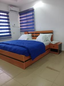 Postel nebo postele na pokoji v ubytování 501 Aparthotel