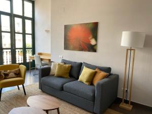 אזור ישיבה ב-Casa Luxe Suites Barcelona