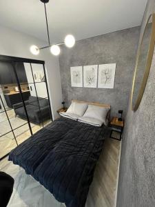 Кровать или кровати в номере Orlik Private Apartment - z widokiem na Śnieżkę, blisko tras turystycznych i wyciągów