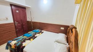 Postel nebo postele na pokoji v ubytování Honolulu Home
