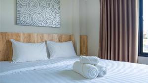 En eller flere senge i et værelse på Allende Canggu