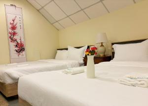 Apamet Hotel Sukhumvit 55客房内的一张或多张床位