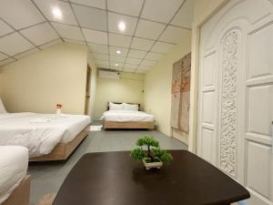 Apamet Hotel Sukhumvit 55客房内的一张或多张床位