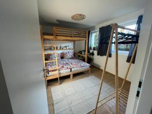Postel nebo postele na pokoji v ubytování Hačaperka domeček