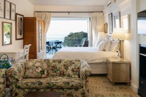 En eller flere senge i et værelse på Kettle's Guesthouse