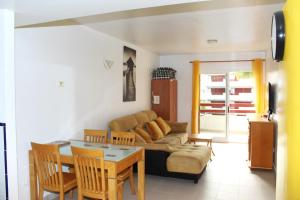 a living room with a couch and a table at Inviting 2 bedroom apartment in Alicante