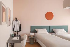 Postel nebo postele na pokoji v ubytování 4BNB - Suites del Gallo